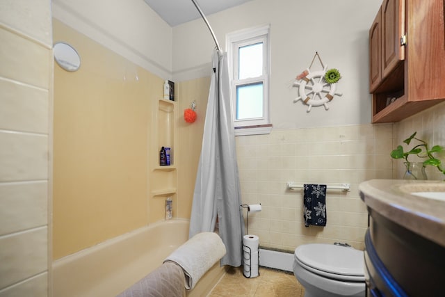 full bathroom featuring vanity, tile patterned flooring, toilet, shower / bath combo with shower curtain, and tile walls