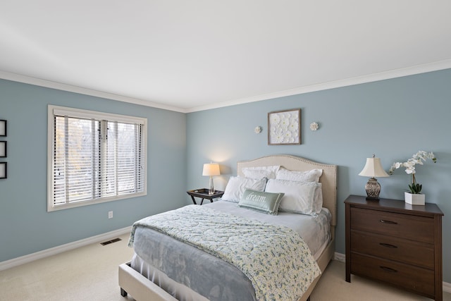 bedroom featuring light colored carpet and crown molding