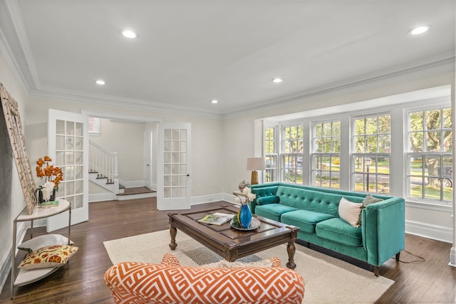 living room featuring french doors, dark hardwood / wood-style floors, and ornamental molding