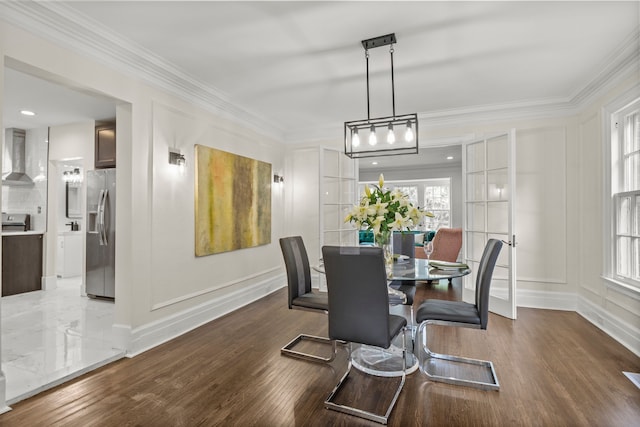 dining room with crown molding, french doors, and dark hardwood / wood-style floors