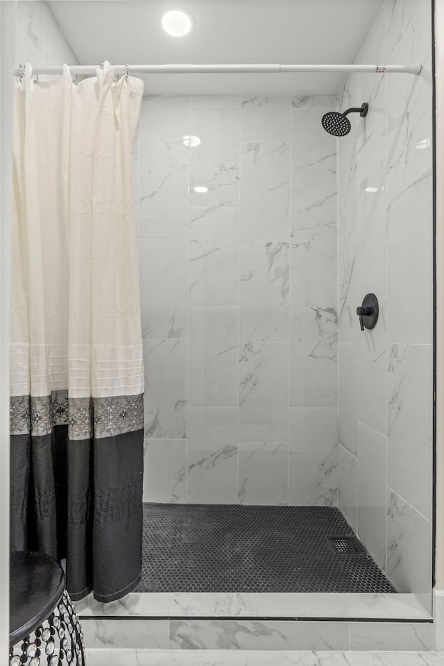 bathroom featuring curtained shower