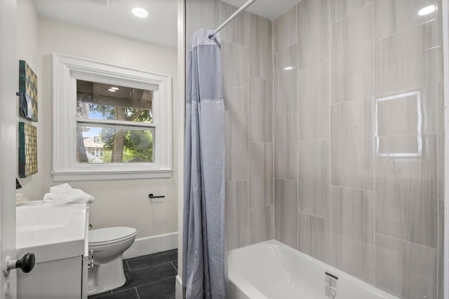 full bathroom with tile patterned flooring, vanity, toilet, and shower / bath combo with shower curtain