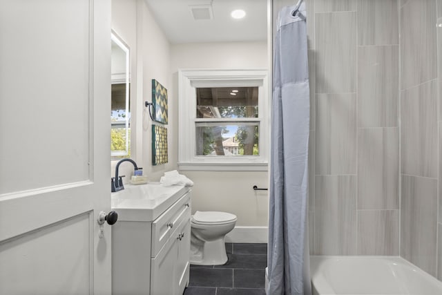 full bathroom with shower / tub combo, vanity, toilet, and tile patterned floors