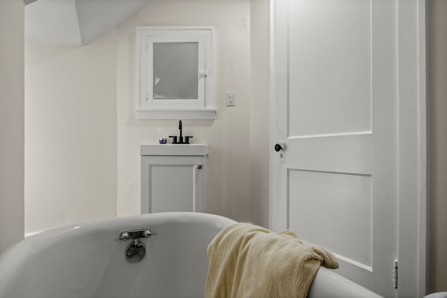 bathroom featuring a bathtub and sink