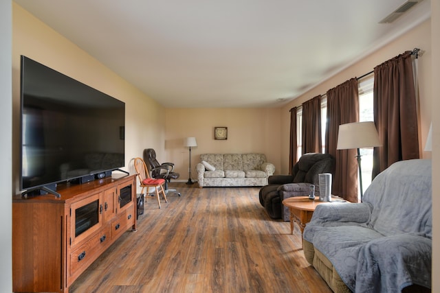 living room featuring dark hardwood / wood-style flooring