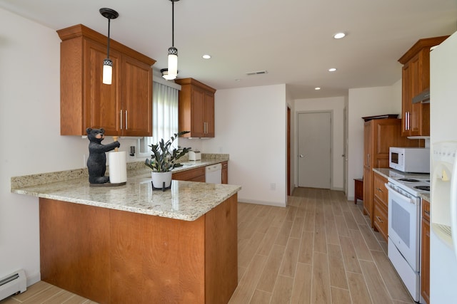 kitchen with kitchen peninsula, light stone counters, white appliances, a baseboard heating unit, and decorative light fixtures