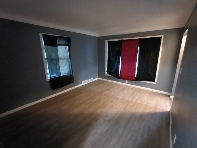 empty room featuring hardwood / wood-style floors