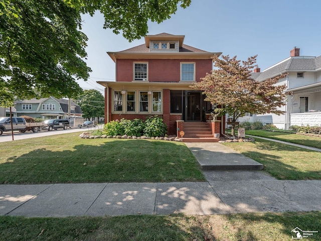 view of front of house with a front lawn