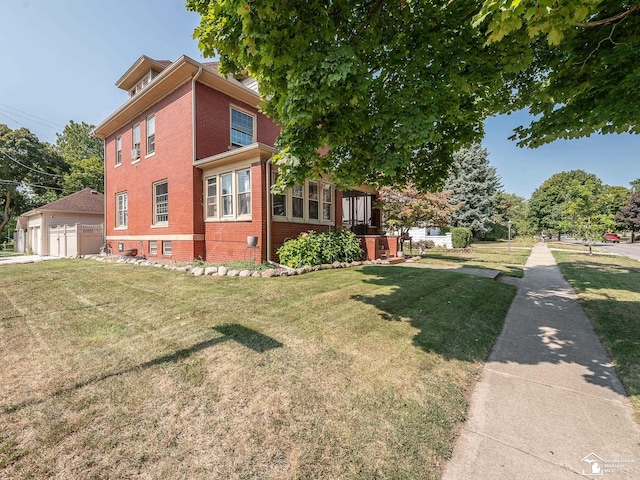 view of side of home with a lawn