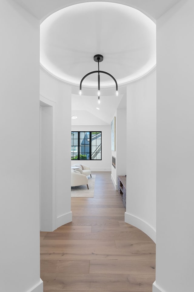 hallway with light wood-type flooring