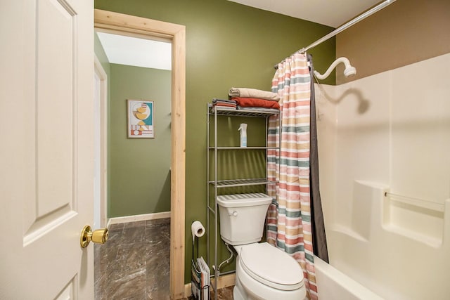 bathroom featuring toilet and shower / bath combination with curtain