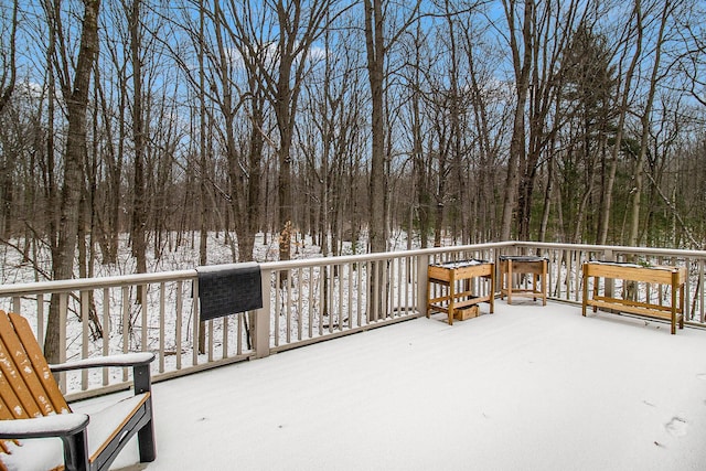 view of snow covered deck