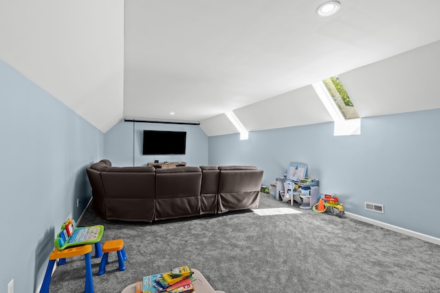 recreation room featuring carpet floors and vaulted ceiling