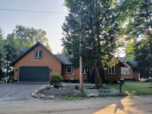 view of front facade with an attached garage and driveway