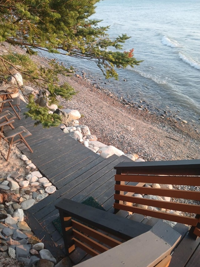 wooden terrace with a water view