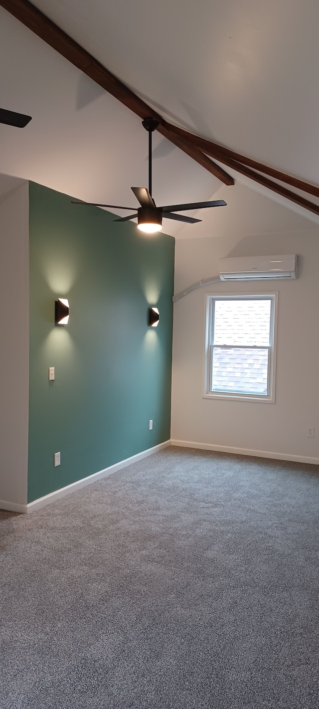 carpeted empty room featuring lofted ceiling with beams, ceiling fan, and an AC wall unit