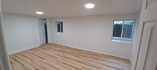 unfurnished room with light hardwood / wood-style floors