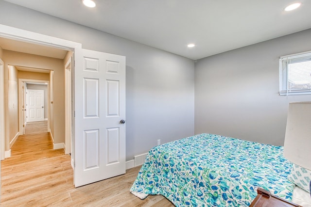 bedroom featuring hardwood / wood-style flooring