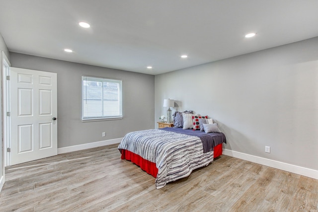 bedroom with light hardwood / wood-style floors