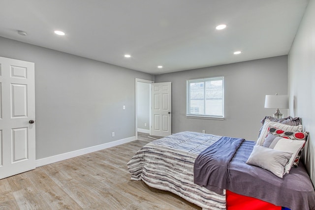 bedroom featuring hardwood / wood-style flooring