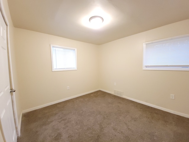 view of carpeted spare room