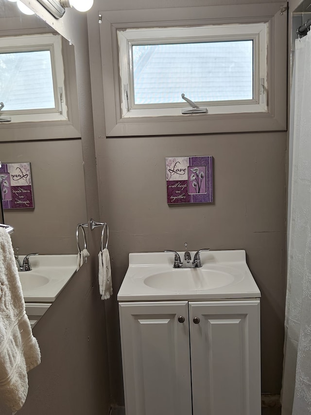 3624 Evergreen Pkwy, Flint, MI 48503 - bathroom featuring vanity