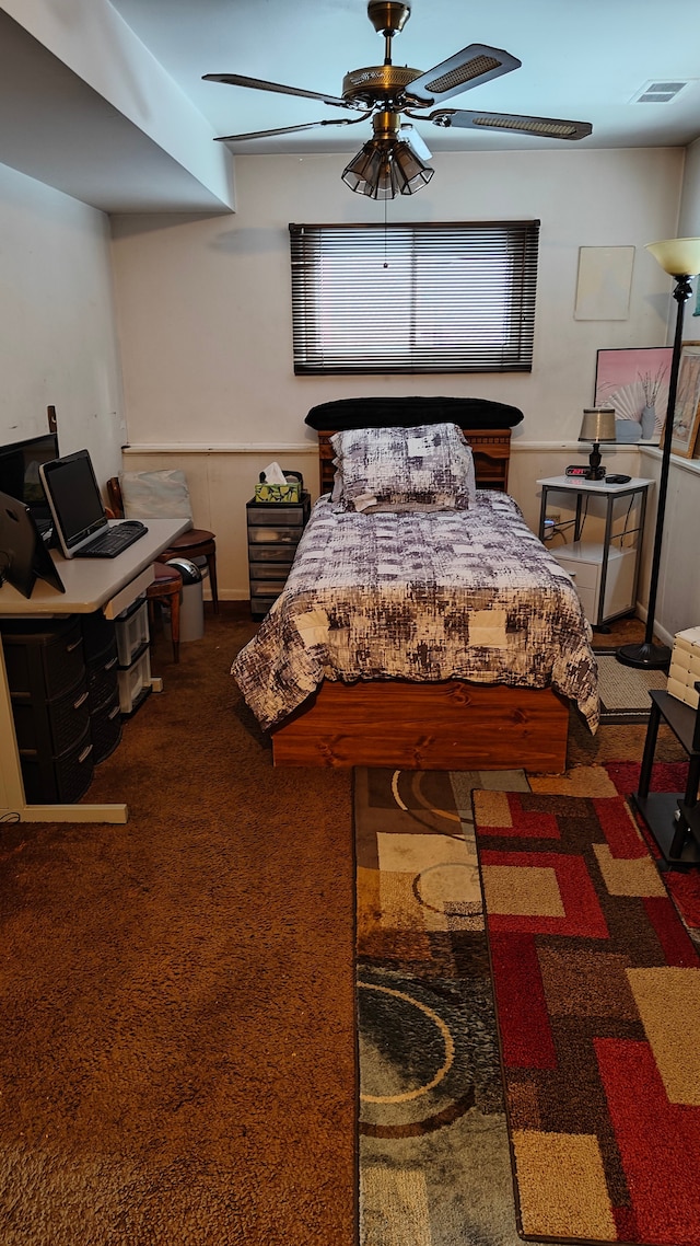 3624 Evergreen Pkwy, Flint, MI 48503 - bedroom with dark carpet and ceiling fan