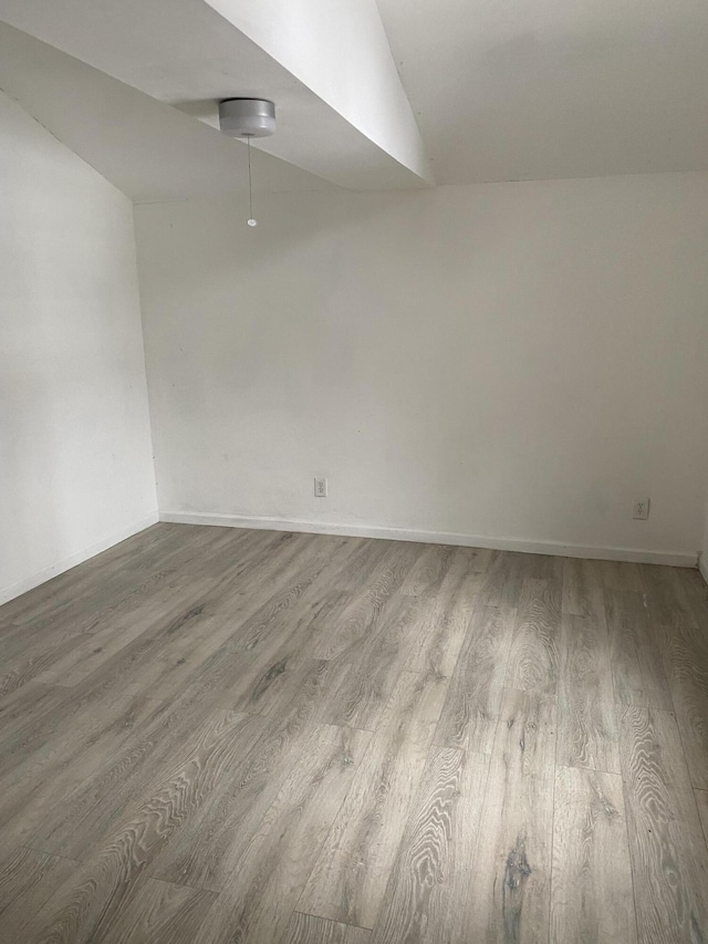 1095 Harding Dr, Grand Blanc, MI 48507 - empty room featuring wood finished floors and baseboards