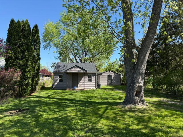 1095 Harding Dr, Grand Blanc, MI 48507 - view of yard featuring an outbuilding