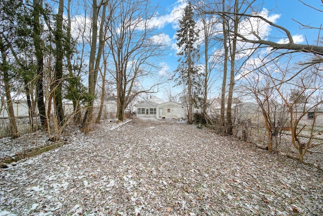 view of yard covered in snow