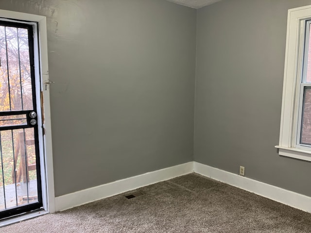 empty room with carpet floors