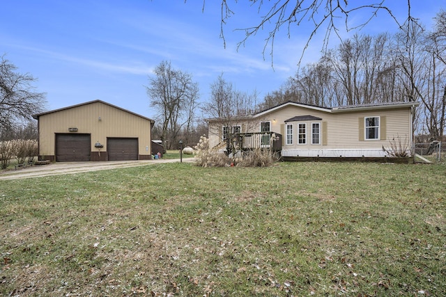 view of property exterior featuring a lawn, a wooden deck, and a garage