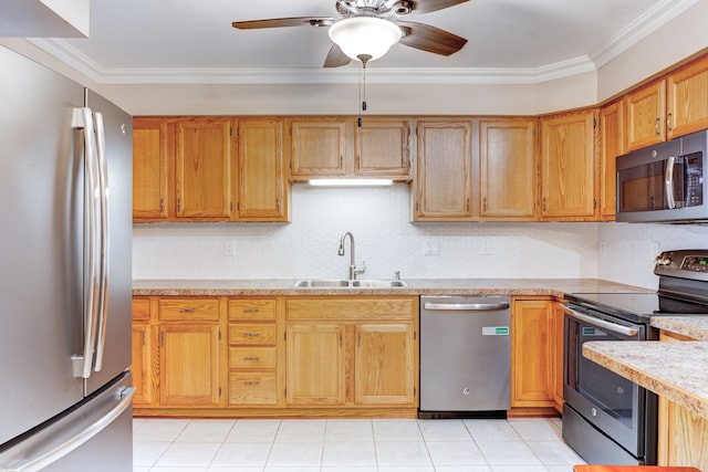 kitchen with ornamental molding, stainless steel appliances, ceiling fan, sink, and light tile patterned flooring