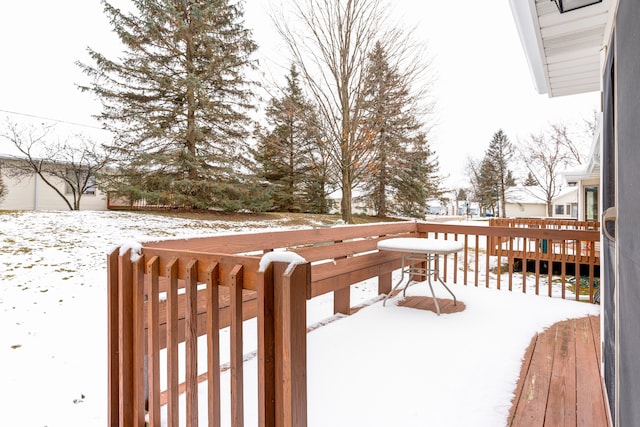 view of snow covered deck