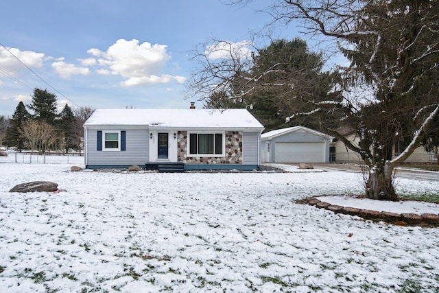 view of front of home with an outbuilding and a garage