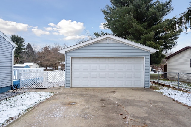 view of snow covered garage