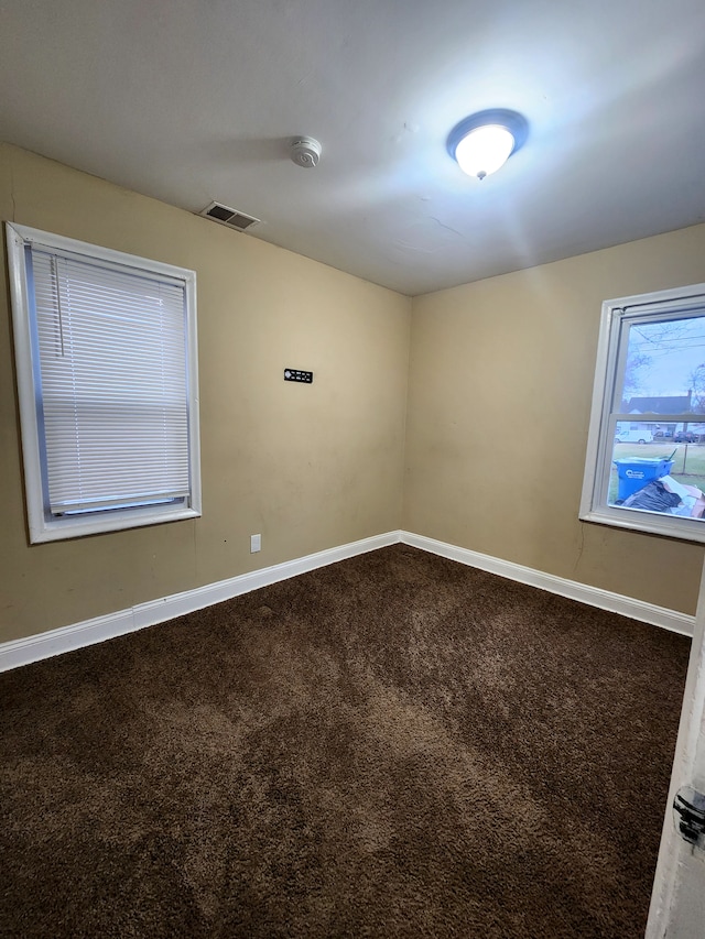 empty room with carpet floors