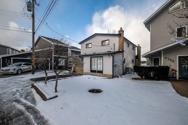 view of snow covered property