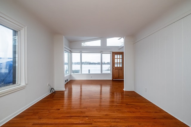 spare room featuring hardwood / wood-style flooring