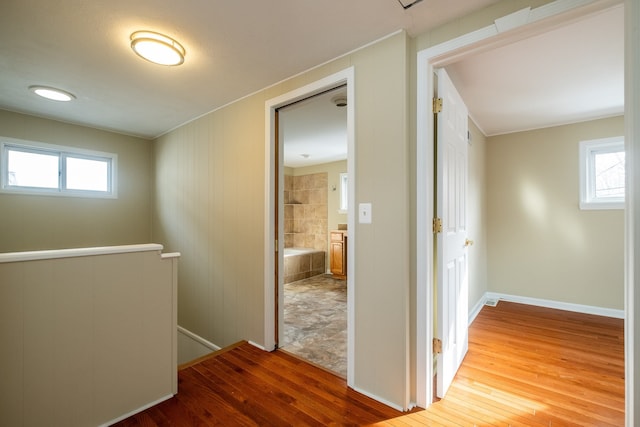 corridor featuring hardwood / wood-style flooring