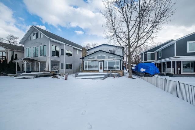 view of snow covered property