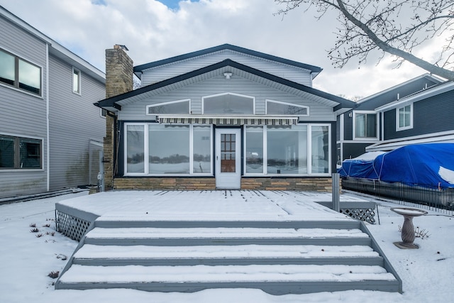 view of snow covered property