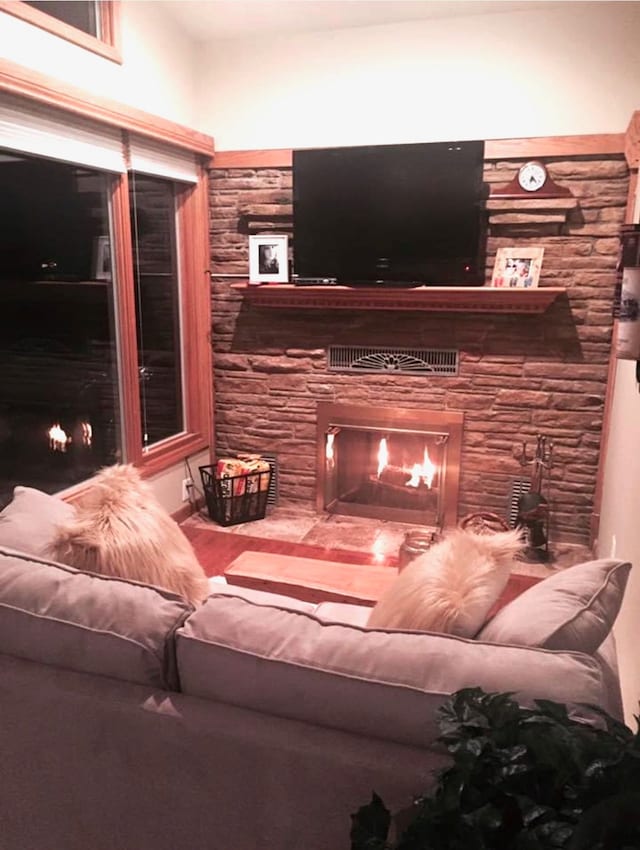 living room with a fireplace