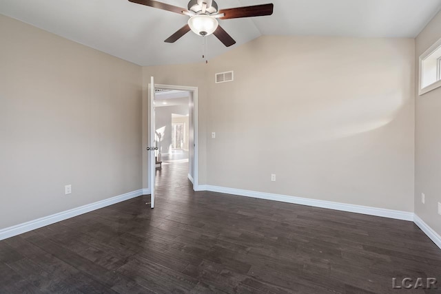 unfurnished room featuring ceiling fan, dark wood-type flooring, and lofted ceiling