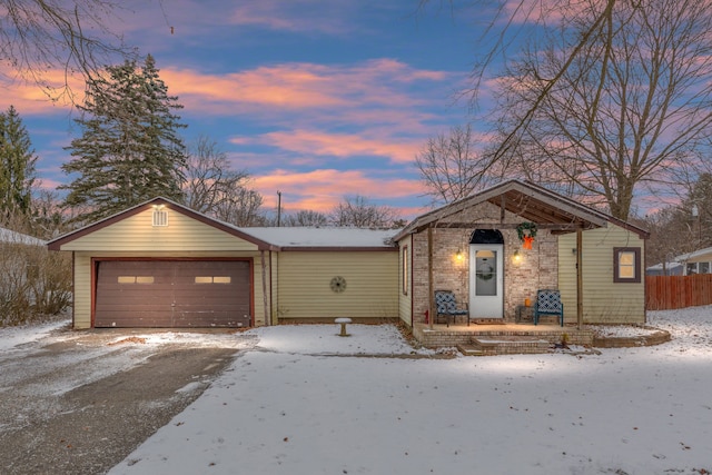 single story home with a garage