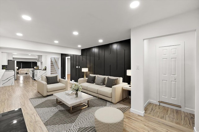 living room with light hardwood / wood-style floors