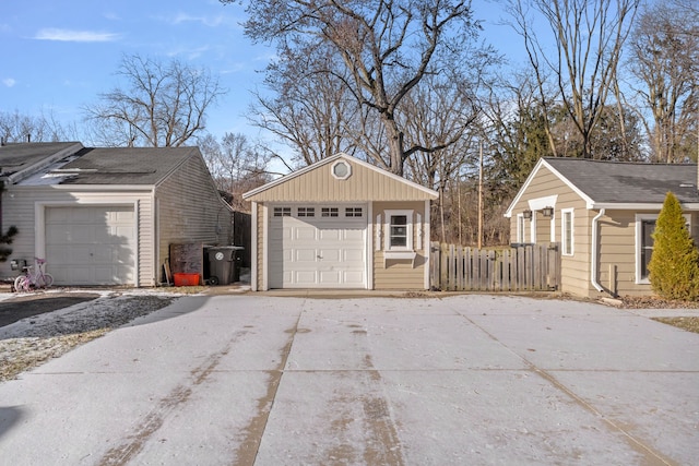 view of home's exterior featuring an outbuilding and a garage