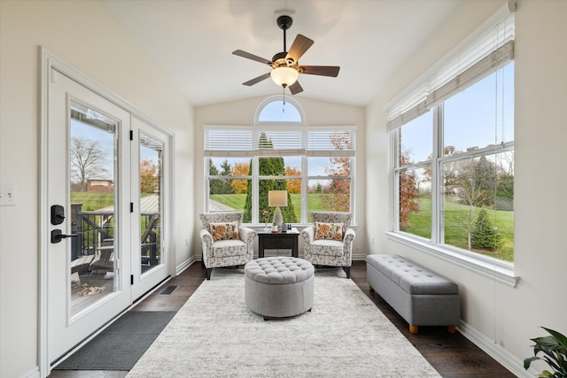 sunroom with a wealth of natural light, ceiling fan, and lofted ceiling