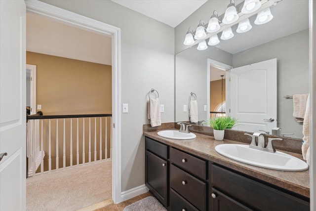 bathroom featuring tile patterned flooring and vanity