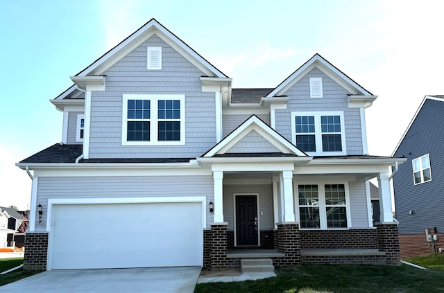 craftsman inspired home with a garage